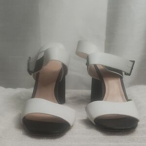 Black and‎ White Stiletto Heels with Classic Pump Silhouette